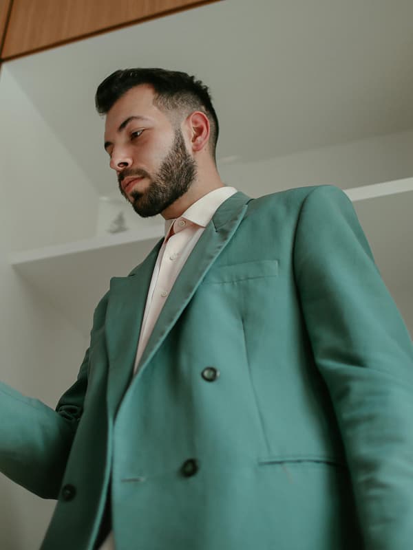 Man holding phone using Bonsai AI financial planning app to reduce money stress